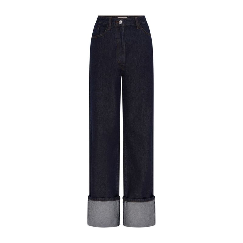 A cutout of dark denim turn up jeans by Omnes