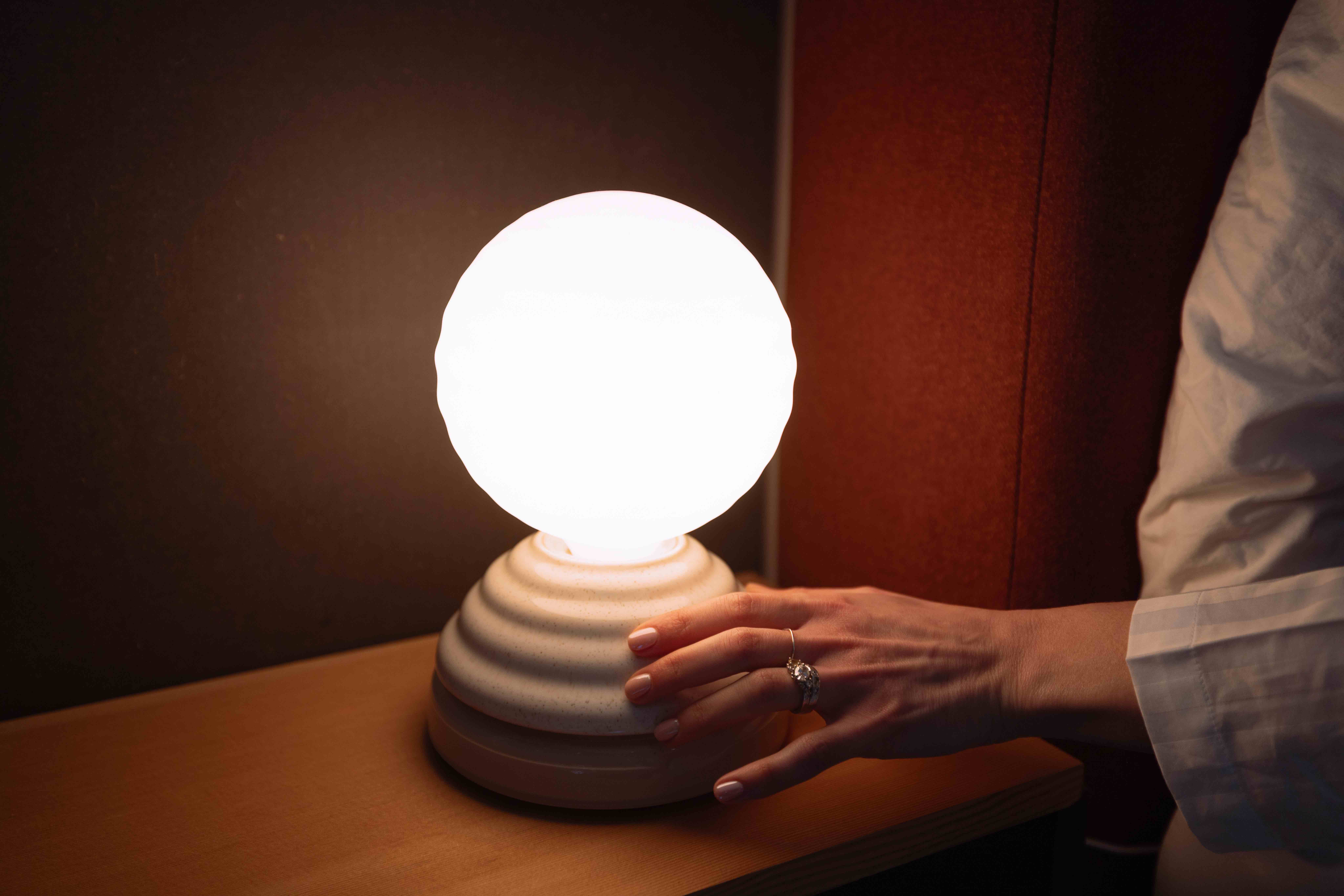 ceramic and glass lamp with orb-like design