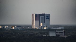 A view of the NASA building. The image has a somber tone.