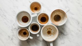 Used coffee cups on a table