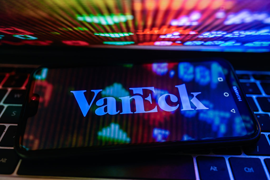 VanEck logo is displayed on a smartphone