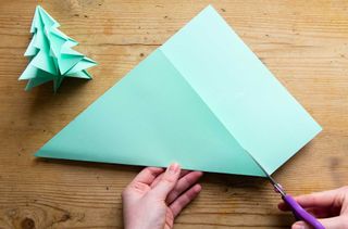 A picture showing how to make an origami Christmas tree at home