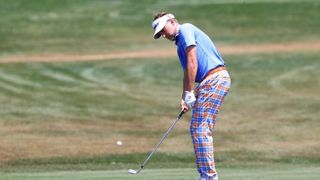 Poulter responds to slow play