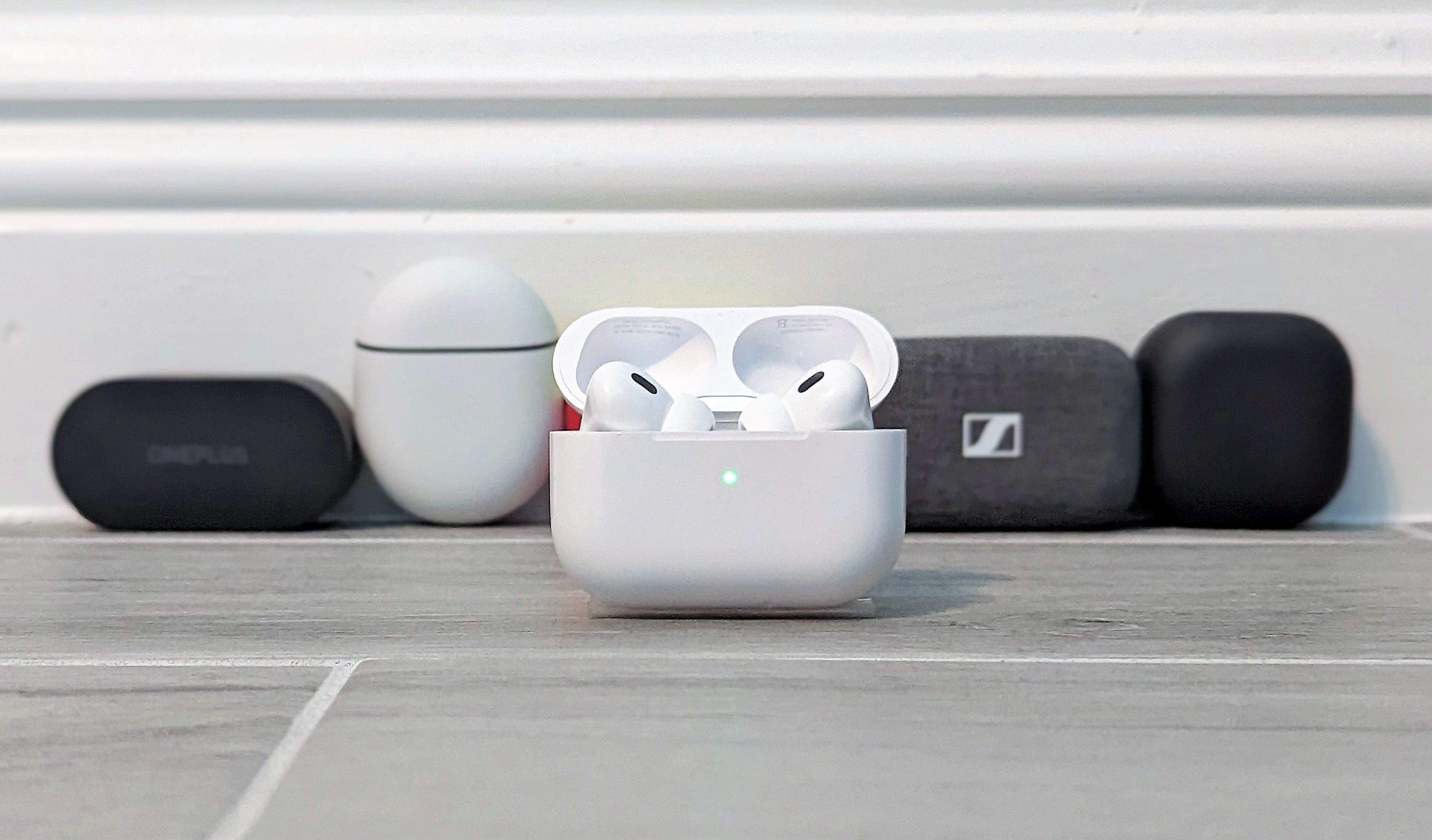 AirPods Pro 2 in the foreground with other models in the background
