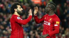 Mohamed Salah and Sadio Mane celebrate Liverpool’s first goal against Sheffield United 