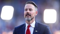 Arsenal director Josh Kroenke celebrates winning the Premier League title