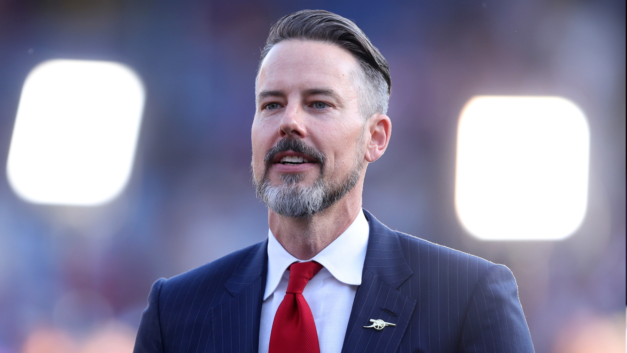 Arsenal director Josh Kroenke celebrates winning the Premier League title