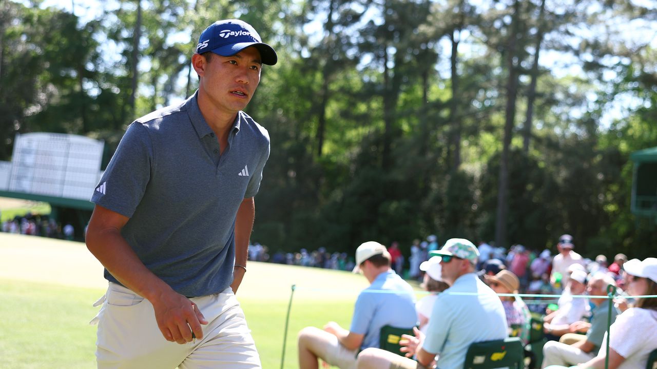 Collin Morikawa walks off a green at the 2024 Masters