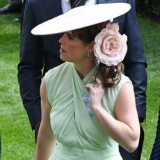 Princess Eugenie wears a mint green dress and a hat at the royal ascot