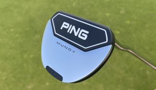 Ping 2022 Mundy Putter on a green background