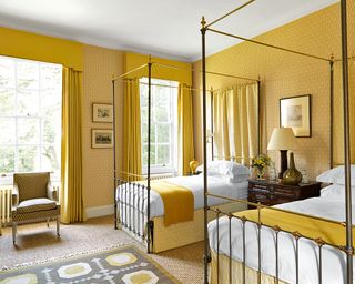 Yellow bedroom ideas with patterned wallpaper