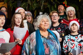 For the first time ever, Miriam tries carol singing at a party!