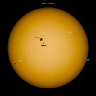 Sunspot AR 1476 compared to the size of Earth. Image released May 10, 2012.