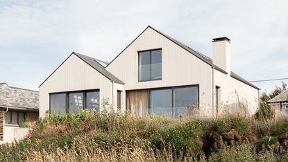 Porthcothan Bay view of a minimalist Cornwall retreat by De Rosee Sa