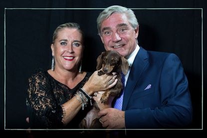 Gogglebox original cast members Steph and Dom posing with a dog