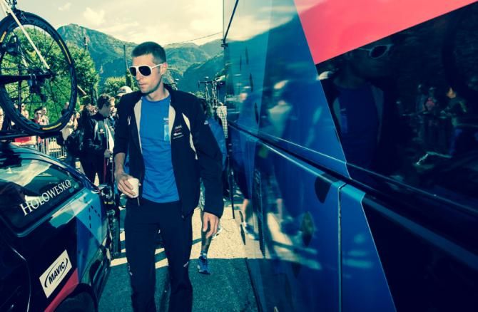 Ryder Hesjedal rocks up to the team bus holding an espresso