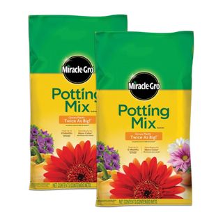 Two bags of potting mix soil