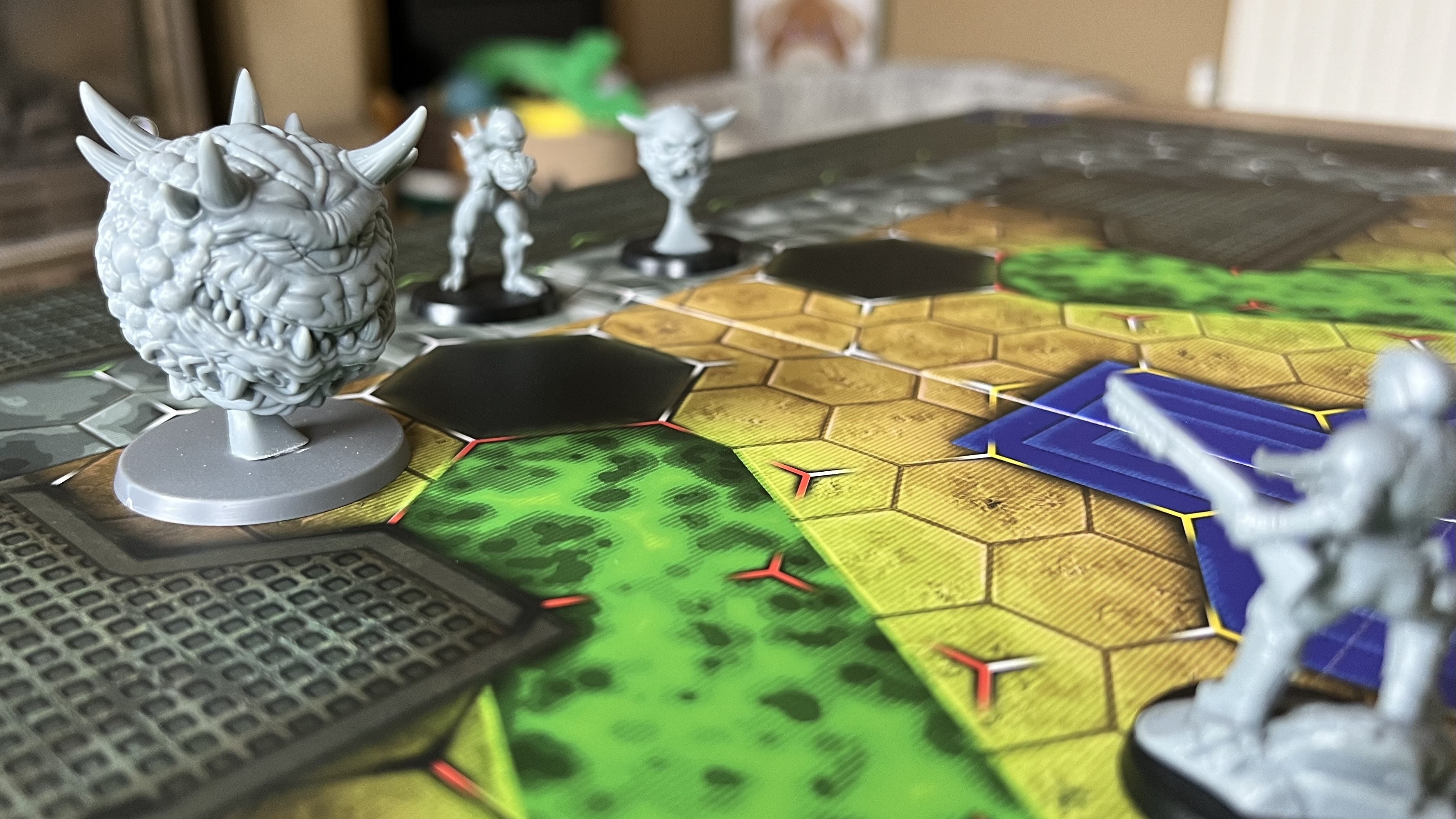 Close up on Cacodemon miniature on a tabletop map in Doom Arena Board Game