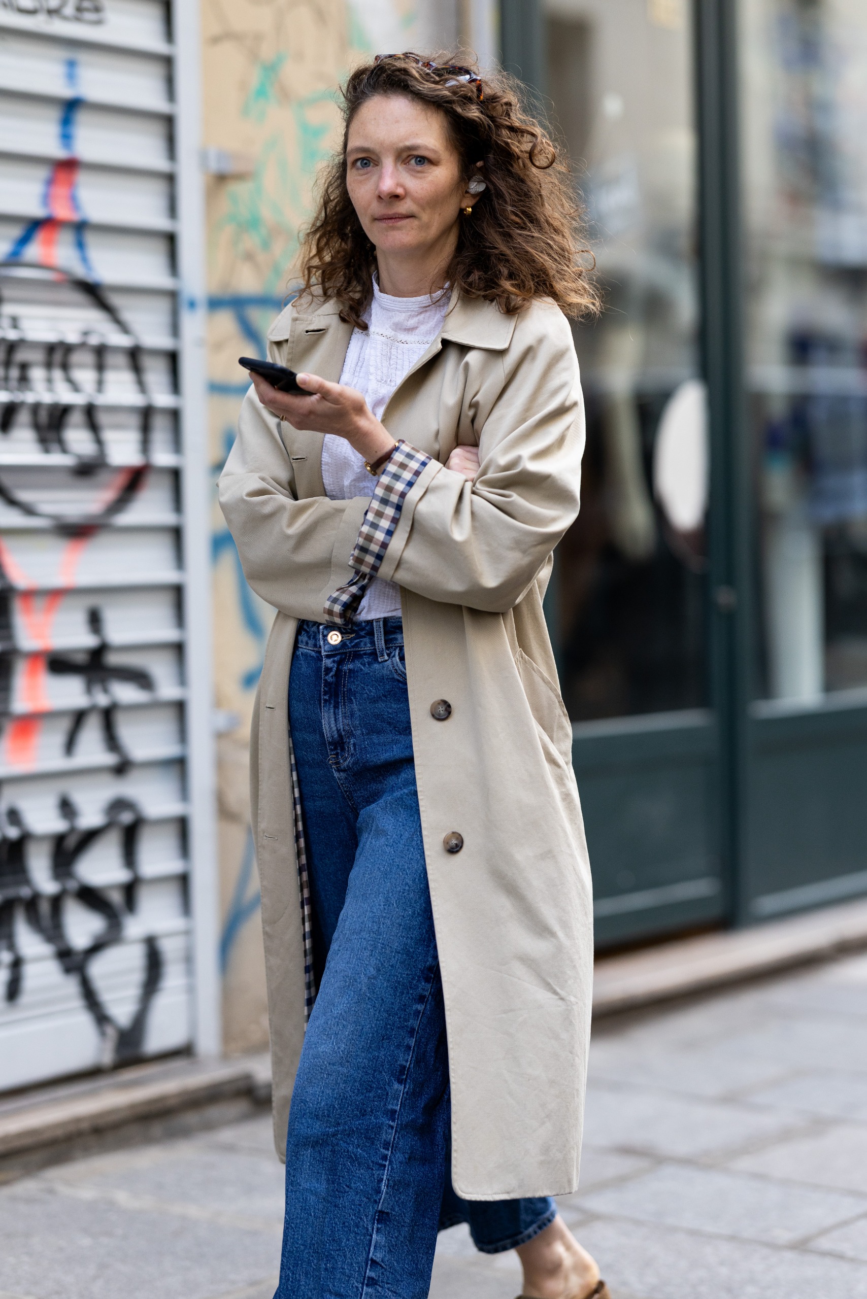 French girls wearing trench coats for fall at Paris Fashion Week