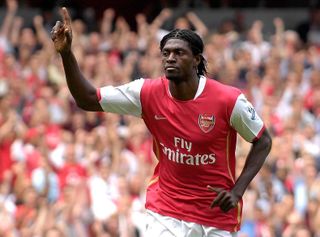 Emmanuel Adebayor celebrates scoring for Arsenal