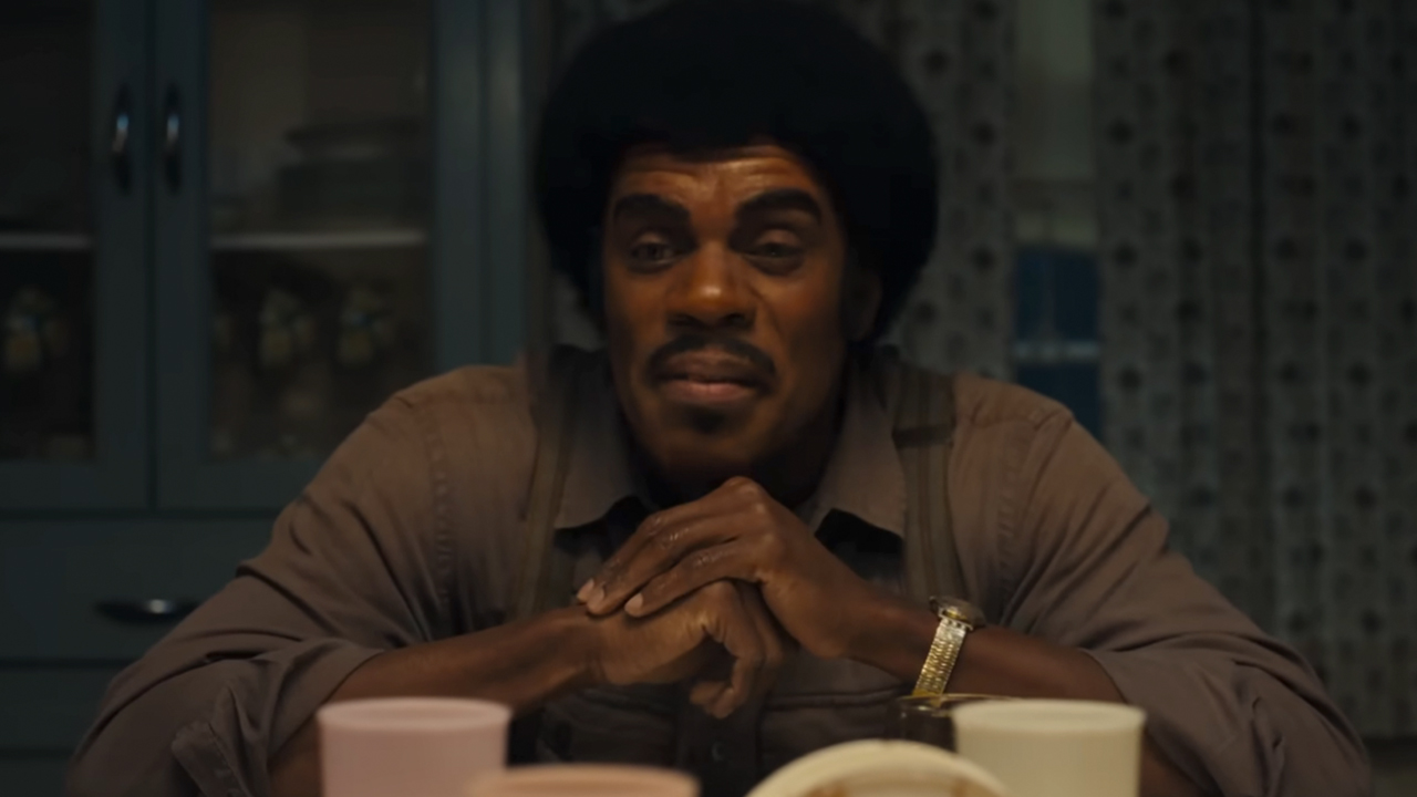 Colman Domingo as Joe Jackson, sitting at a kitchen table, scowling.