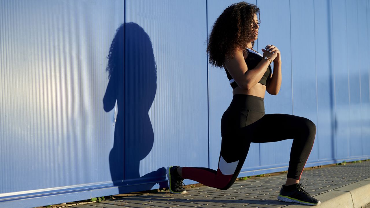 Woman holding a lunge