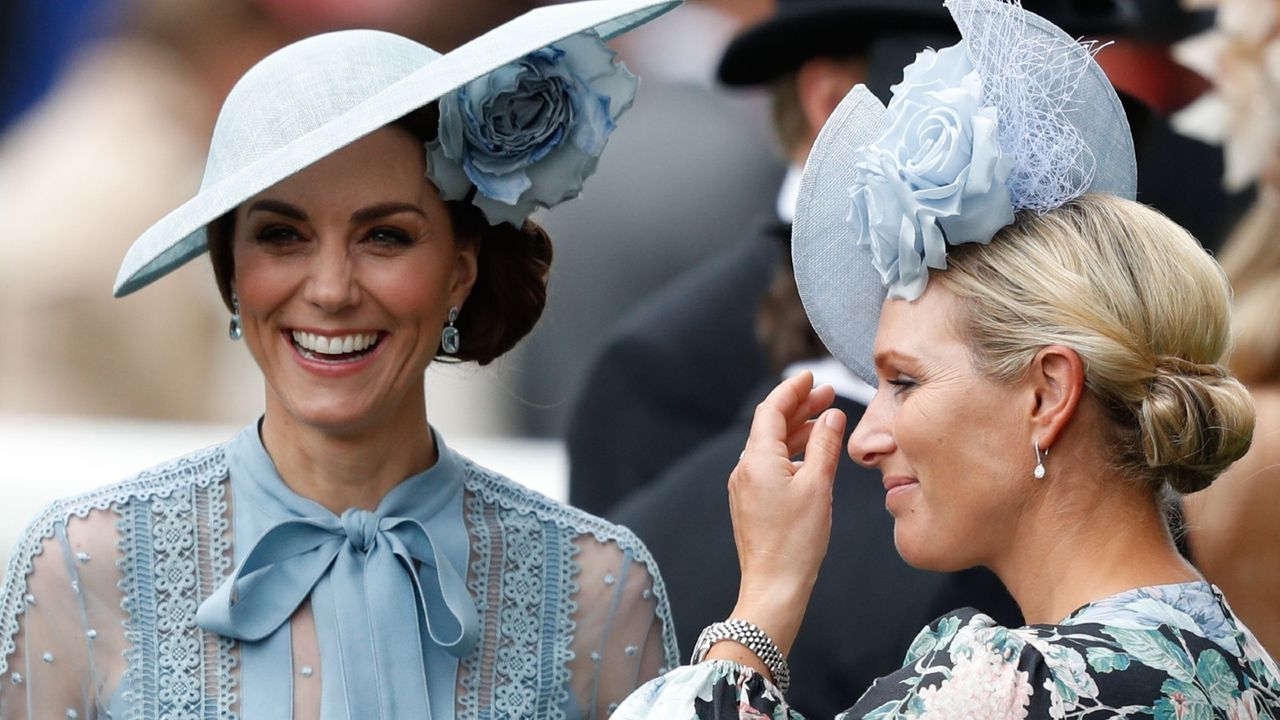 Britain&#039;s Catherine, Duchess of Cambridge, (L) and Zara Phillips (R) attend on day one of the Royal Ascot horse racing meet, in Ascot, west of London, on June 18, 2019.