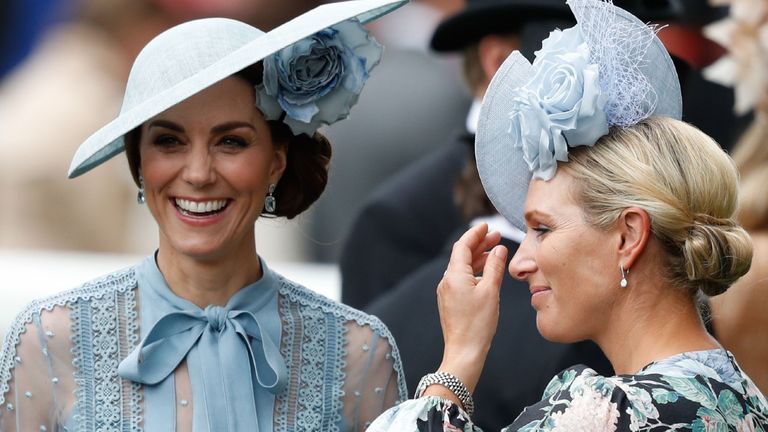 Britain's Catherine, Duchess of Cambridge, (L) and Zara Phillips (R) attend on day one of the Royal Ascot horse racing meet, in Ascot, west of London, on June 18, 2019.