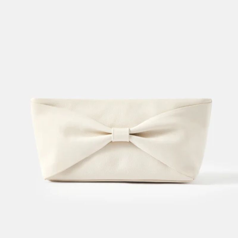 white bow front clutch