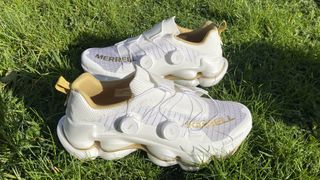 Merrell SpeedArc Surge Boa walking shoes on grass