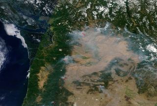 The Terra satellite captured this image over western and central Washington state on Aug. 17, 2015. Five major fires are burning in the north central part of the state. In addition, the Tower Fire in the northeastern corner of the state and the Cougar Creek Wildfire in the southwestern part of the state are adding to the smoke. The red pixels are heat signatures detected by the Moderate Resolution Imaging Spectroradiometer (MODIS) instrument onboard NASA's Aqua satellite.