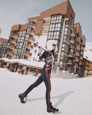 Anna Vitiello wear Fendi ski suit.