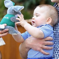 Baby Prince George holding a stuffed bilby toy