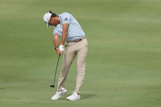 Rafa Cabrera Bello hitting a 3-wood off the fairway