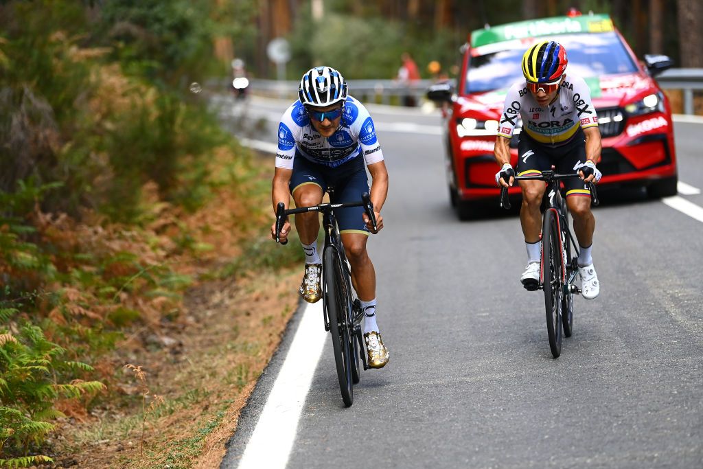NAVACERRADA SPAIN SEPTEMBER 10 LR Richard Carapaz of Ecuador and Team INEOS Grenadiers Polka Dot Mountain Jersey and Sergio Andres Higuita Garcia of Colombia and Team Bora Hansgrohe compete in the breakaway during the 77th Tour of Spain 2022 Stage 20 a 181km stage from Moralzarzal to Puerto de Navacerrada 1851m LaVuelta22 WorldTour on September 10 2022 in Puerto de Navacerrada Spain Photo by Tim de WaeleGetty Images