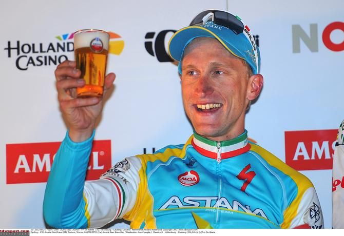Astana's Enrico Gasparotto enjoys a winning beer after the 2012 Amstel Gold