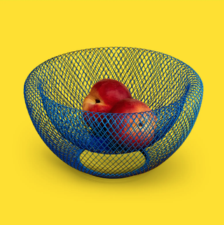 blue mesh bowl with fruit inside