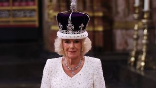 LONDON, ENGLAND - MAY 06: Queen Camilla stands after being crowned by Archbishop of Canterbury Justin Welby during her coronation ceremony in Westminster Abbey, on May 6, 2023 in London, England. The Coronation of Charles III and his wife, Camilla, as King and Queen of the United Kingdom of Great Britain and Northern Ireland, and the other Commonwealth realms takes place at Westminster Abbey today. Charles acceded to the throne on 8 September 2022, upon the death of his mother, Elizabeth II.