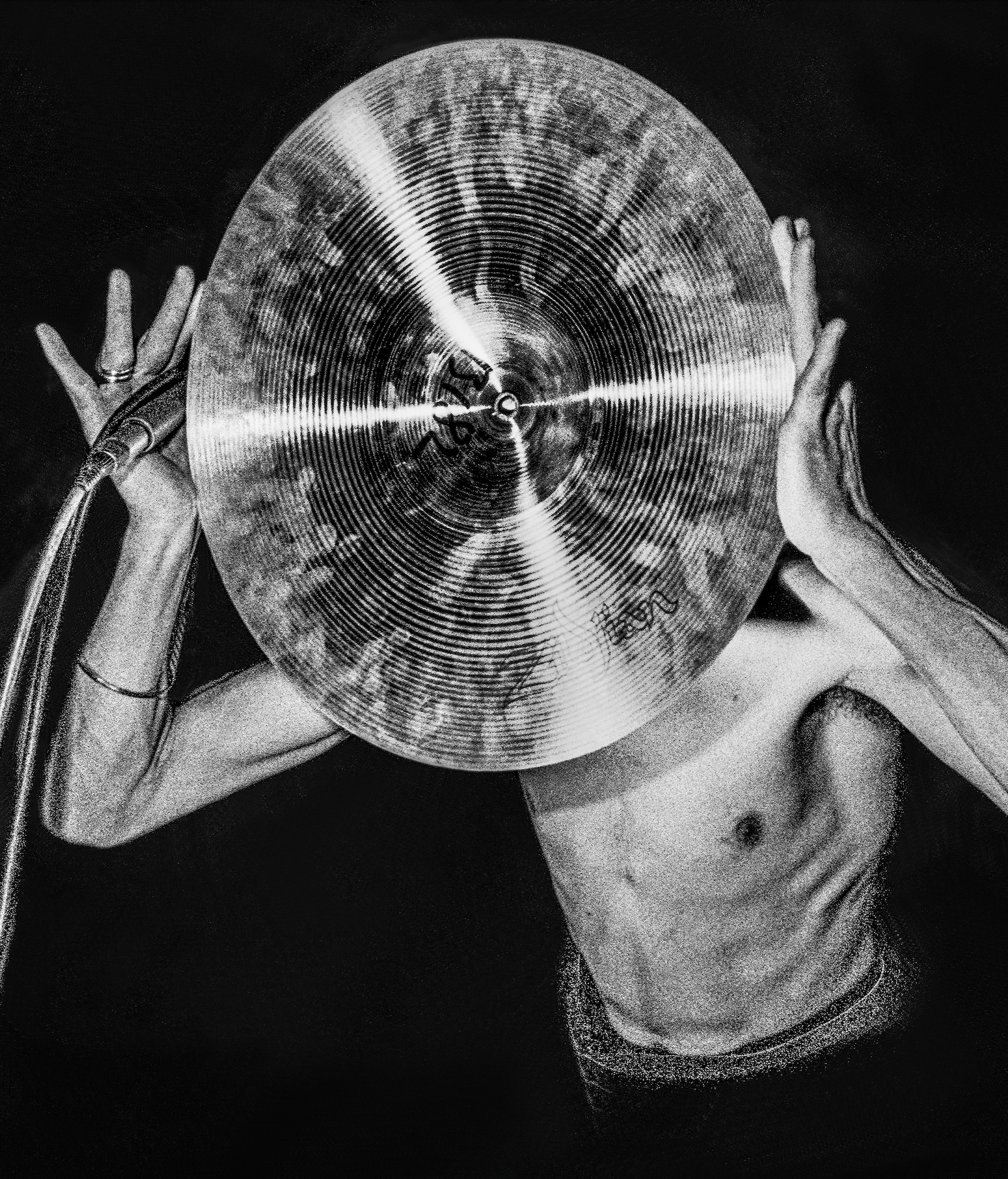 Photograph of performer holding cymbal in front of him, from &amp;lsquo;Unruly &amp;ndash; The Body in Punk&amp;rsquo; at ARoS in Aarhus, an exhibition exploring the history of punk