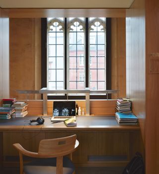 Inside the Magdalen College library with a Barber & Osgerby chair