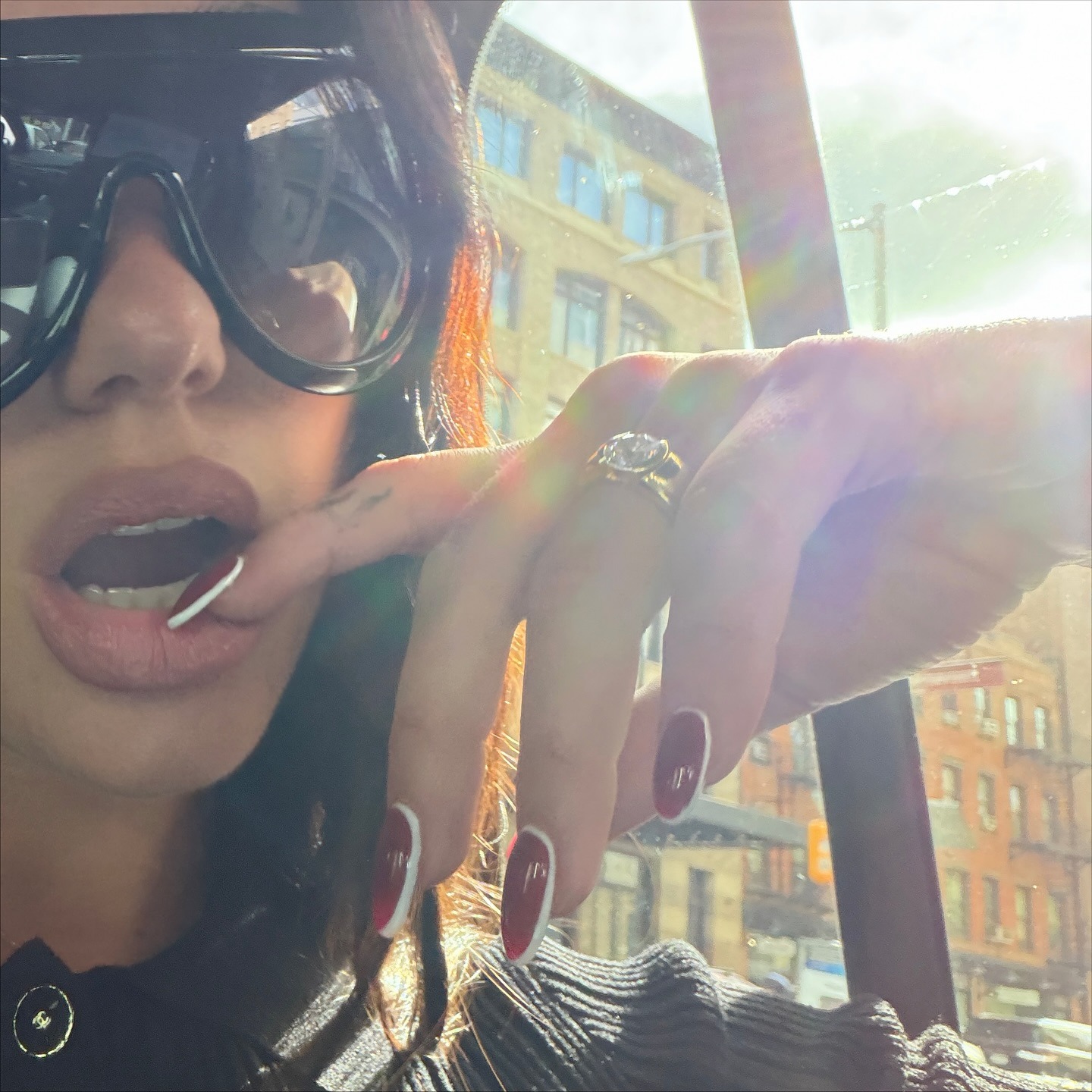 Dua Lipa's red "halo" nails
