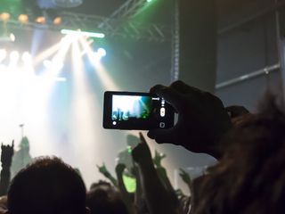 Phone held up during a concert