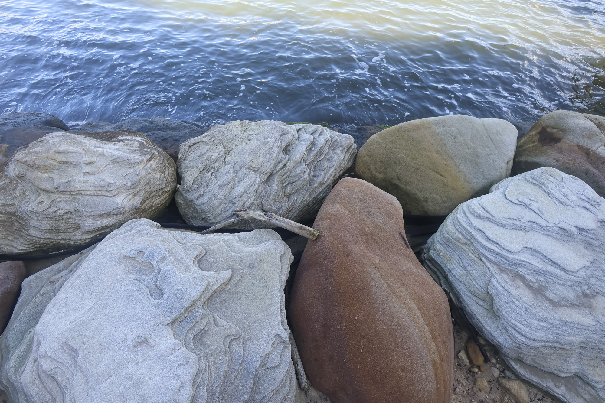 Closeup of rocks by a river