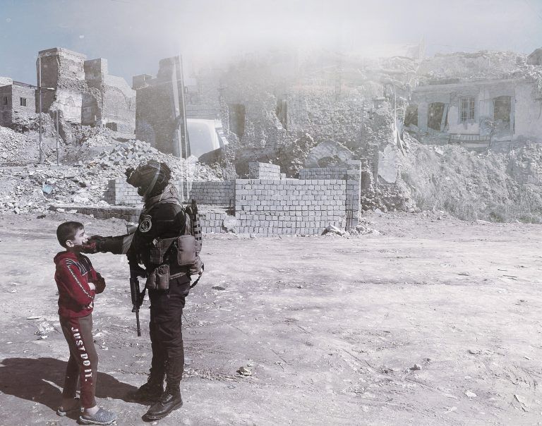 Photograph titled "The Kid of Mosul," showing an image of a young boy and soldier shot on iPhone 11 in Mosul, Iraq