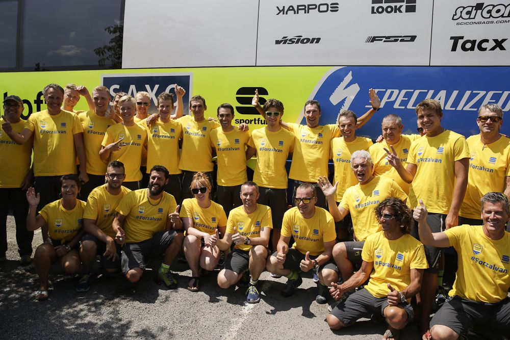 Tinkoff-Saxo hold their rest day press conference in a parking lot.