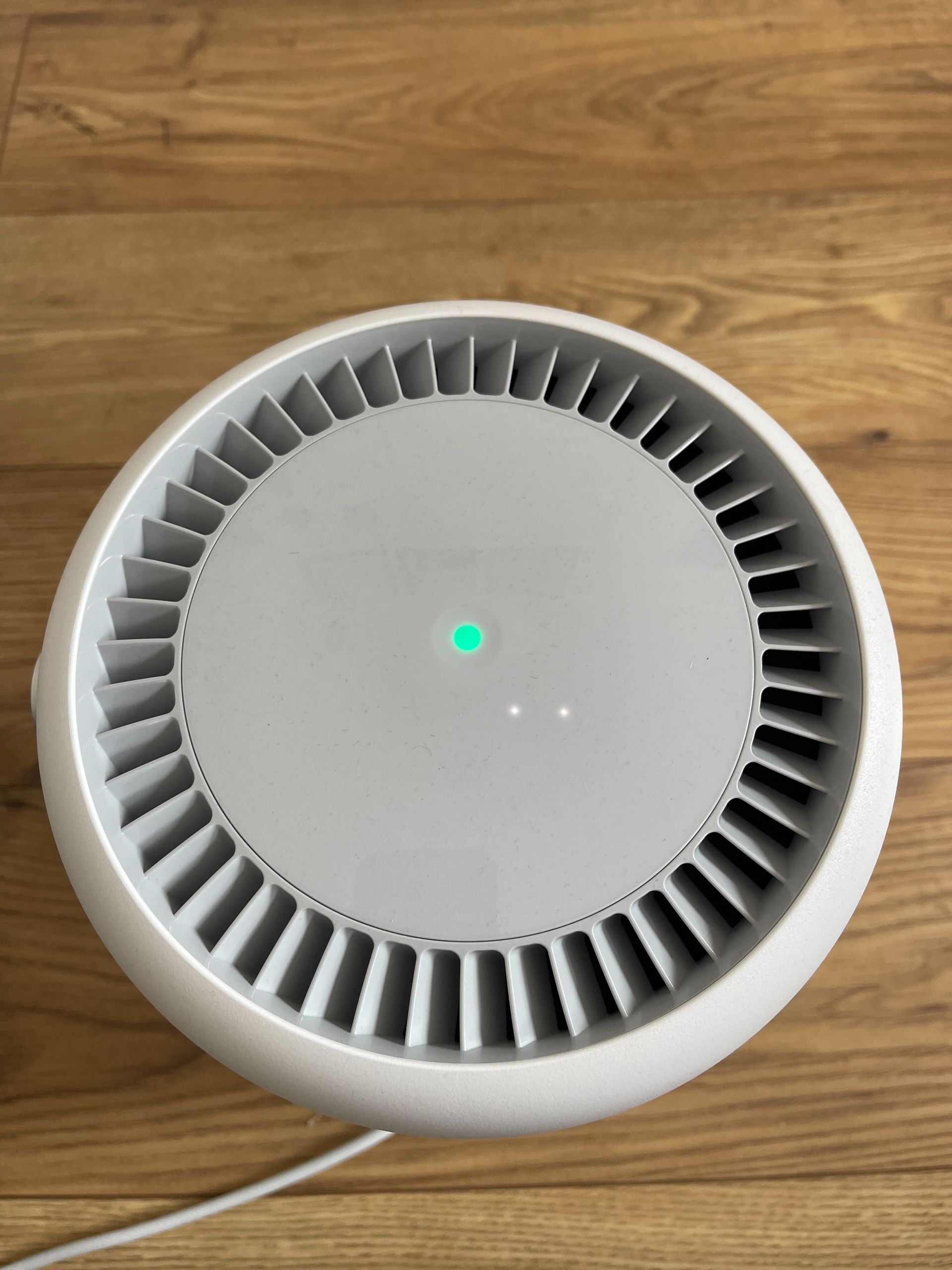 Molekule Air Mini+ touch control panel on top of air purifier in Dan Fauzi's home