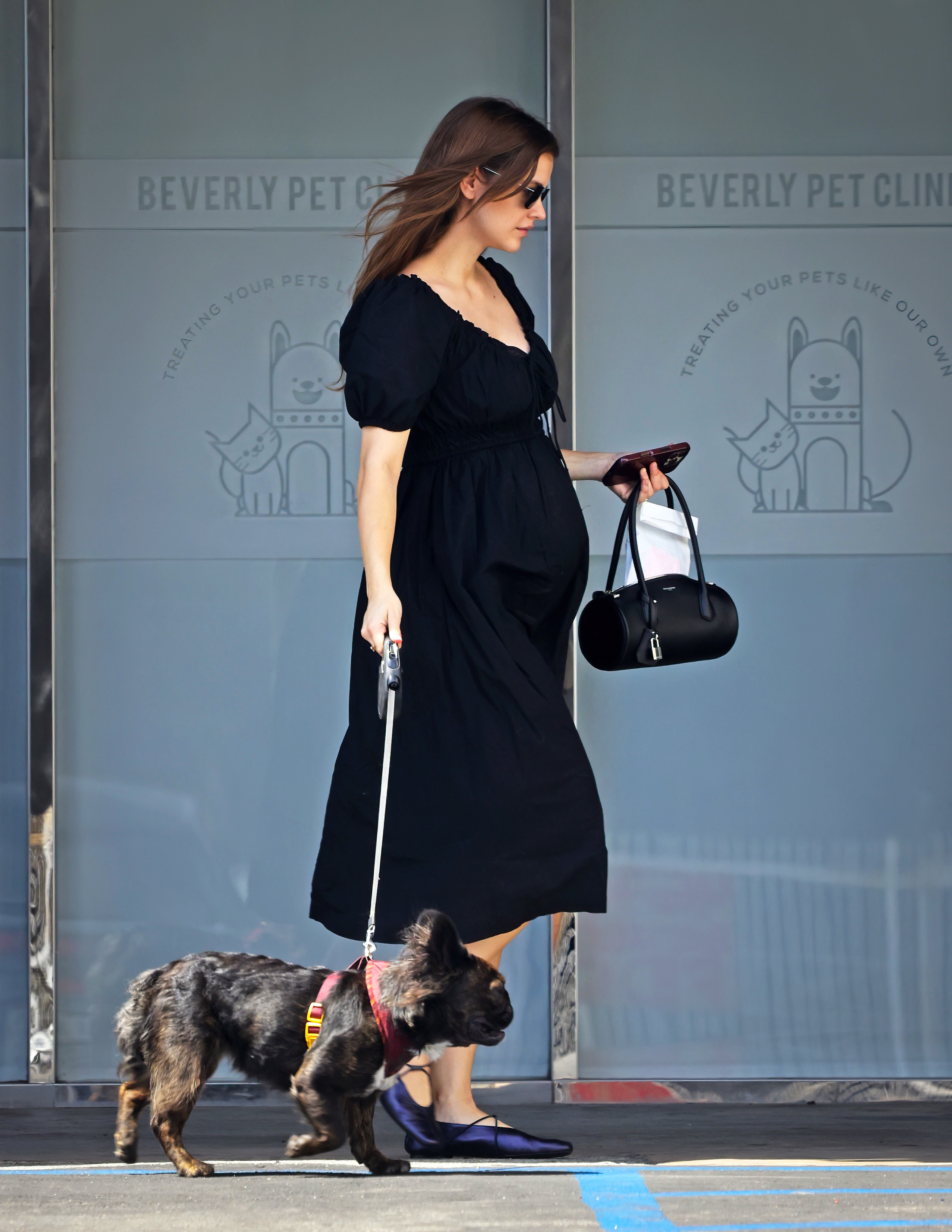 Barbara Palvin styled the Mary Janes shoe trend with a maternity dress may 29