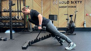 Ollie Thompson demonstrates the chest-supported dumbbell row