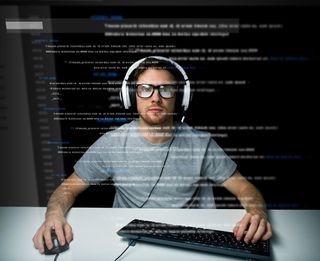man reading computer code