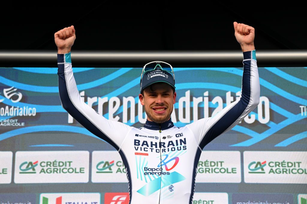 GUALDO TADINO ITALY MARCH 06 Phil Bauhaus of Germany and Team Bahrain Victorious celebrates at podium as stage winner during the 59th TirrenoAdriatico 2024 Stage 3 a 225km stage from Volterra to Gualdo Tadino 527m UCIWT on March 06 2024 in Gualdo Tadino Italy Photo by Tim de WaeleGetty Images